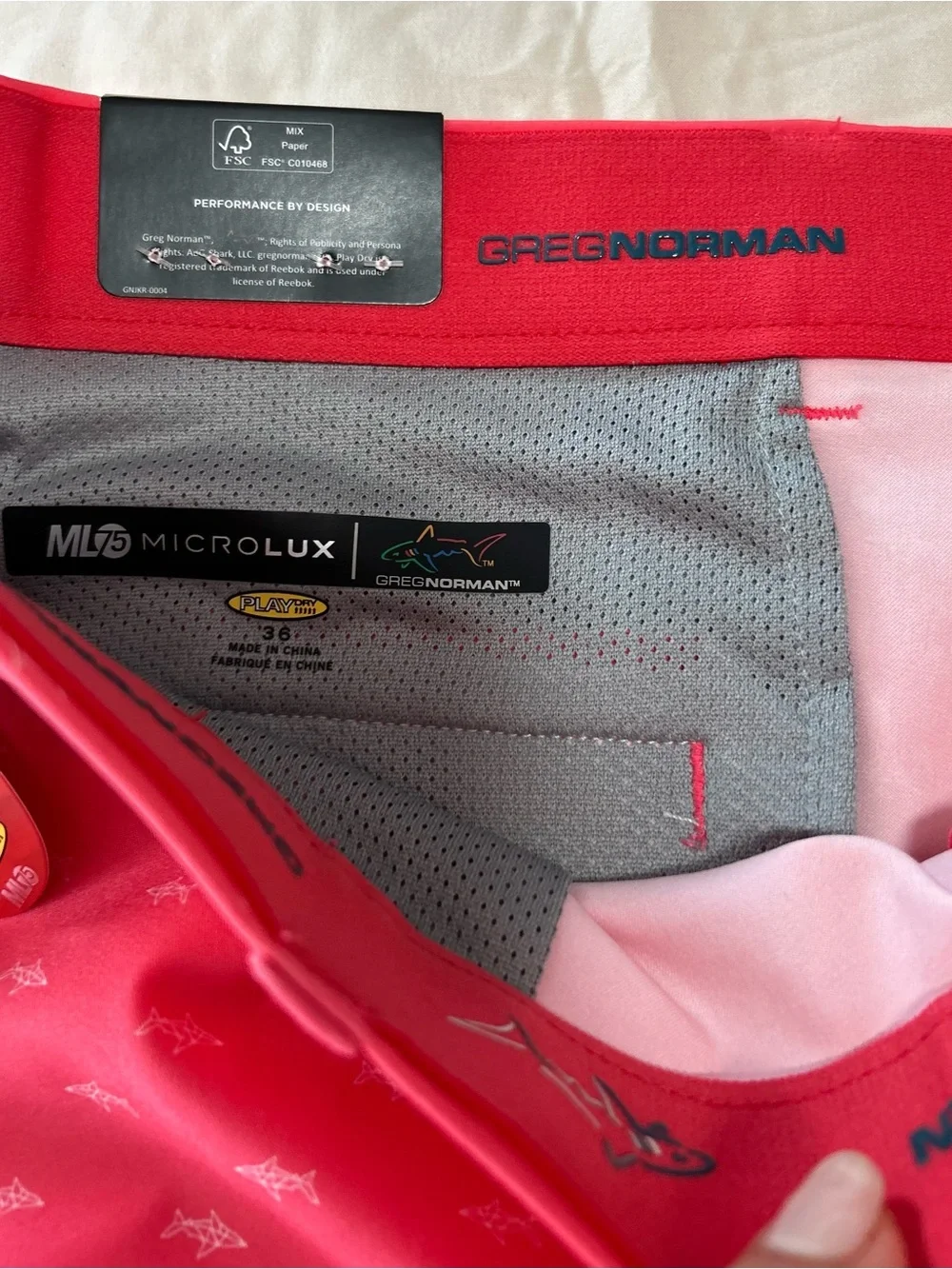 NWT Greg Norman Golf Shorts Men’s  36 Coral Pink AOP Shark Print Stretch